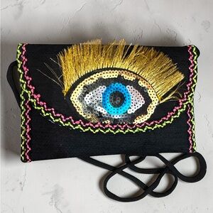 Handwoven Evil Eye Crossbody Bag.
New.